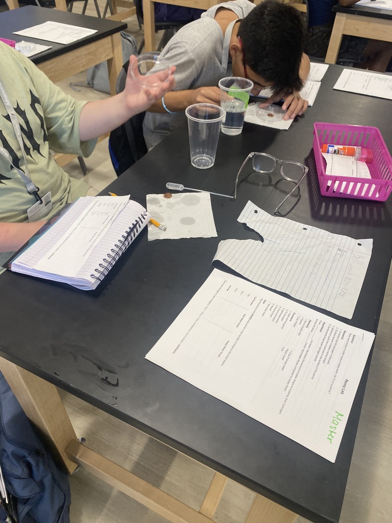 Students conducting experiments with water!