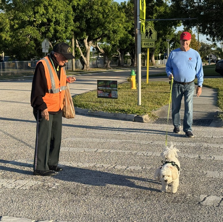 miss Maggie greets one of her dog friends