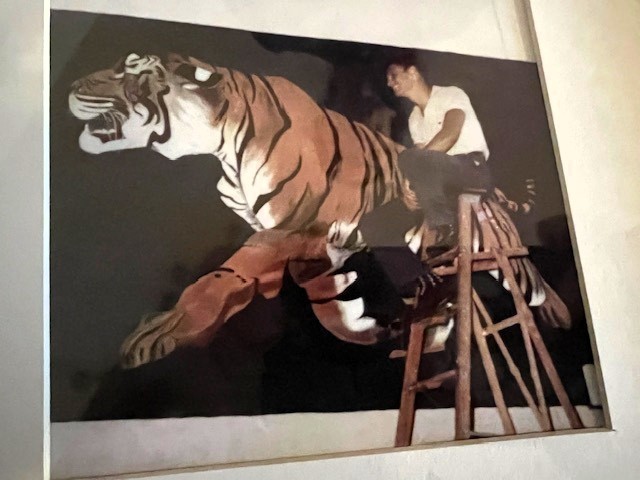 Ray and the old gym tiger mural he painted in 1959.
