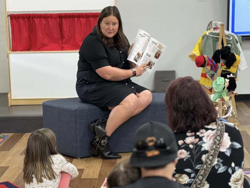 A teacher and first time author reads her book at The Soar Lab in Bradenton, Florida