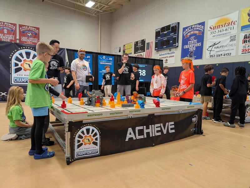 students competing in a VEX robotics competition