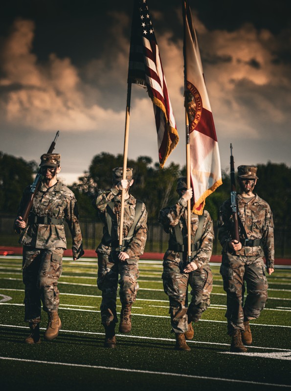 Blake Sanchez' art piece with colorguard with the colors