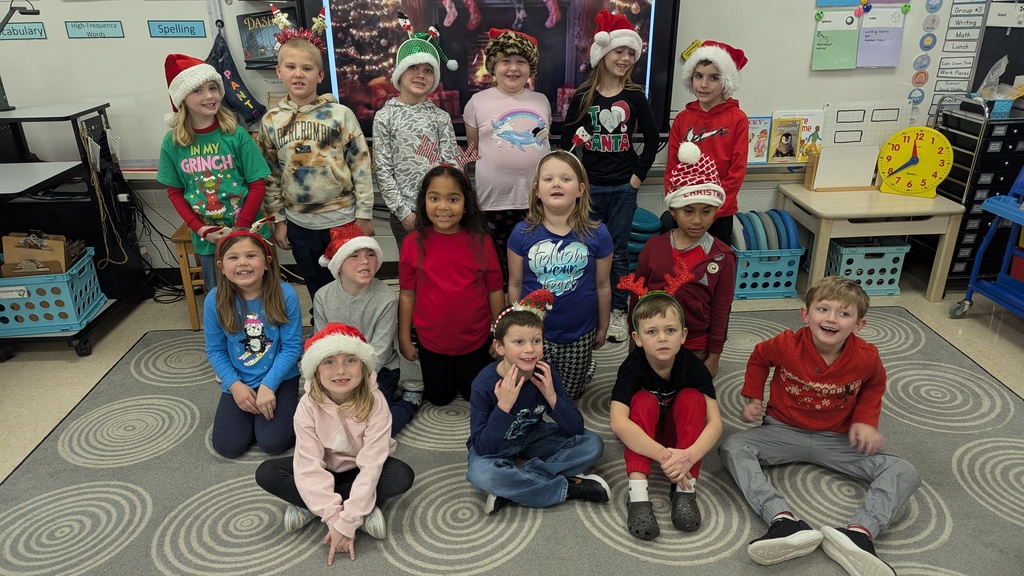 Mrs. Berger's class was festive today for Tree Topper Day! 