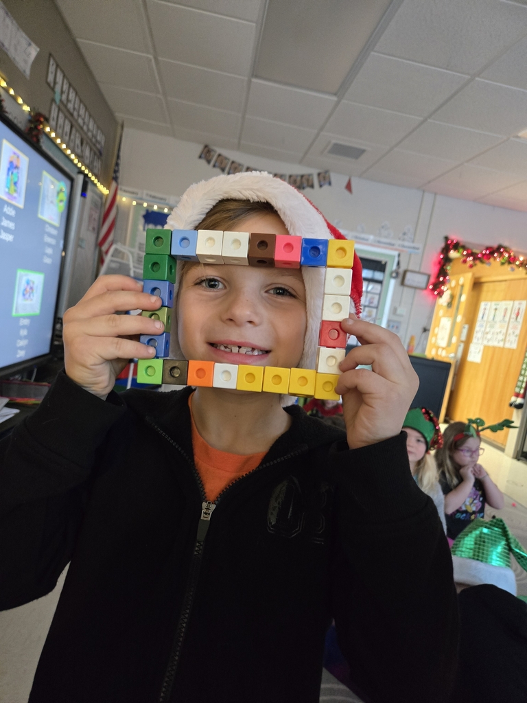 student building with connector cubes