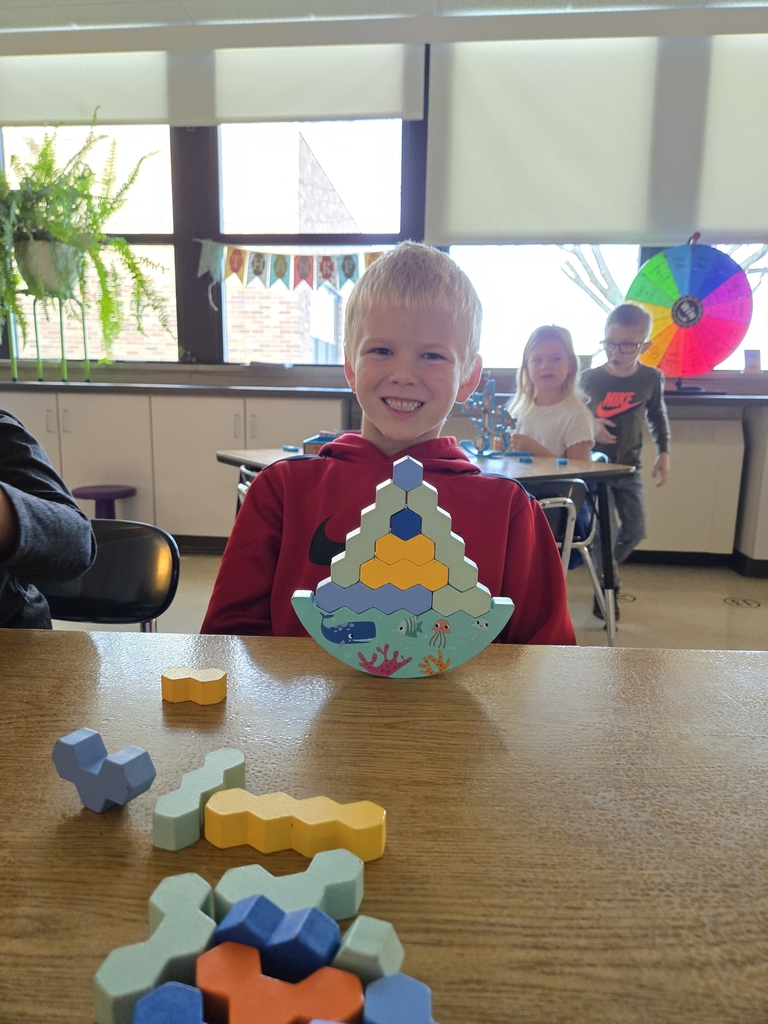 student balancing with hex blocks