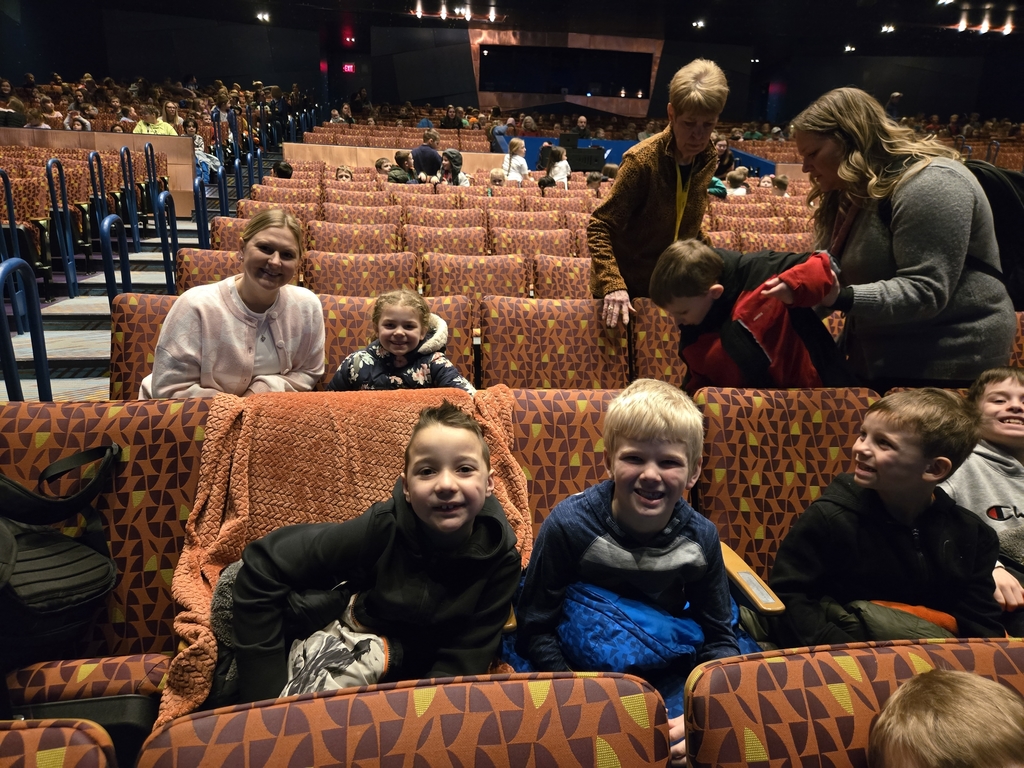 students in theater seats