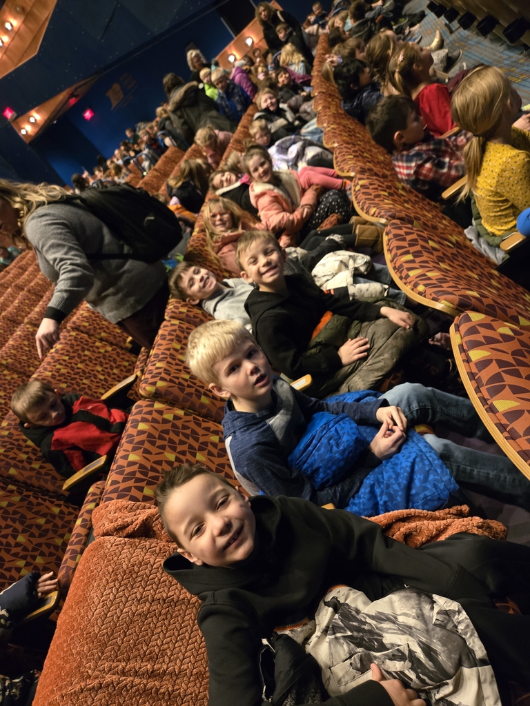 students in theater seats