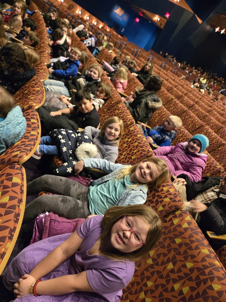 students in theater seats