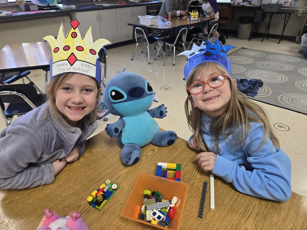 students building with legos