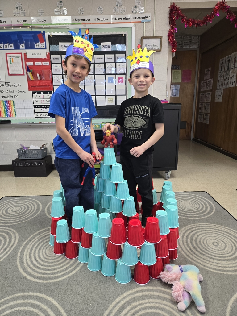 students building with 100 cups