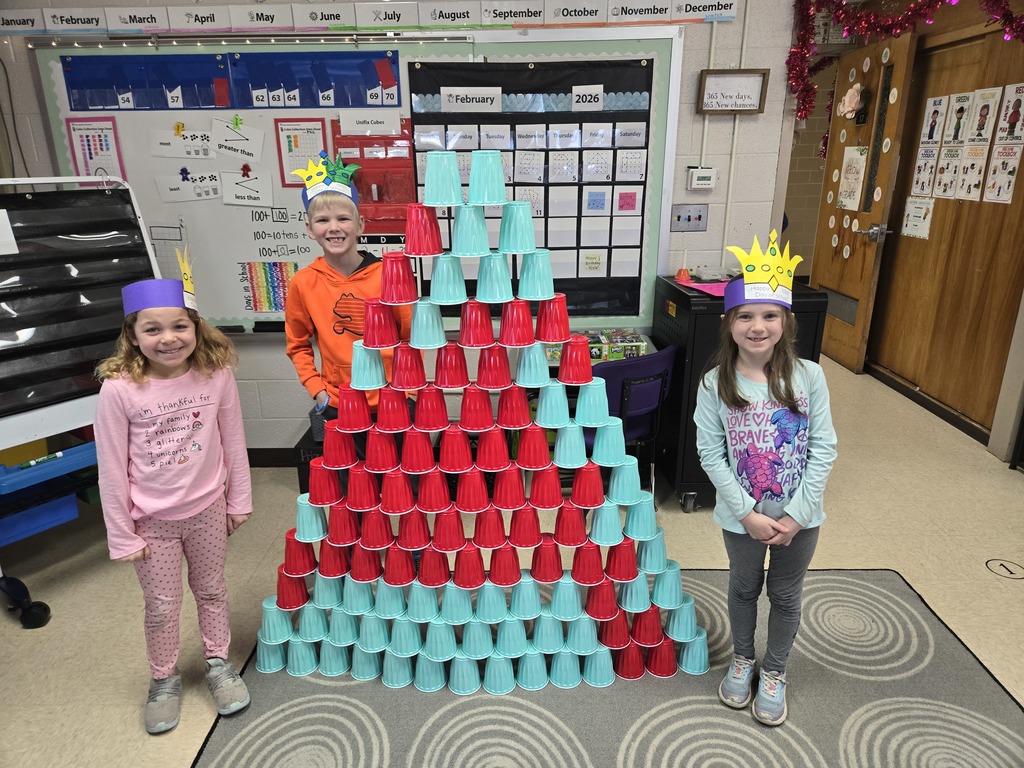 students building with 100 cups