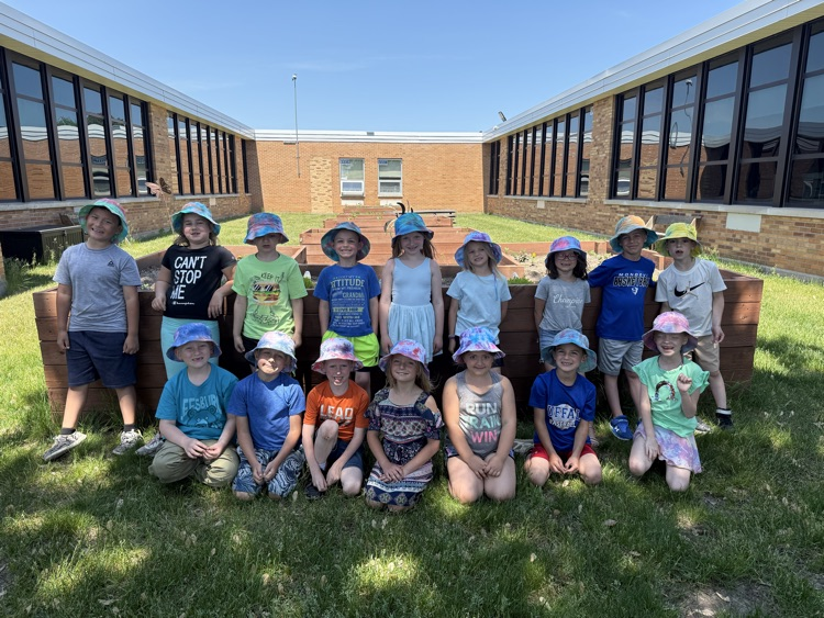 Class picture with hats