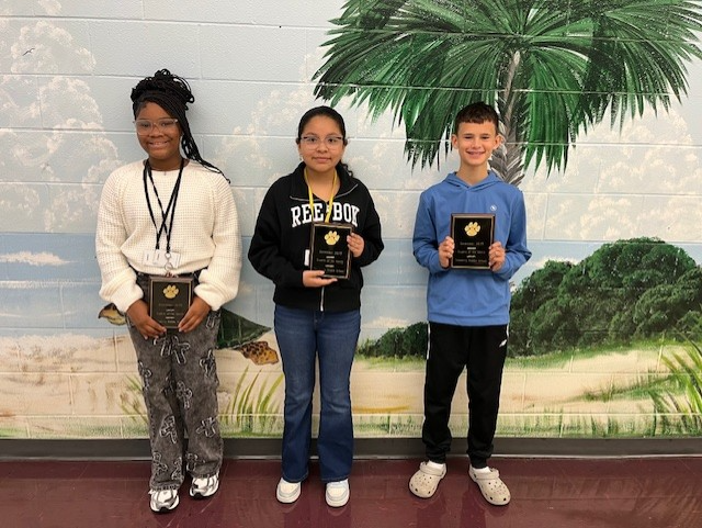 STUDENTS OF THE MONTH: Left to Right 6th-Kennedi Jones, 7th-Maite Gonzalez Martinez, & 8th-Maddox Harvey