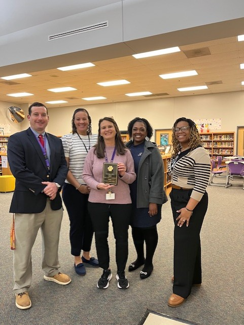 Left to Right: Mr. Reid-Principal, Dr. Jeter-Asst. Principal, Holding Plaque-Bonnie Frick, Ms. Jennifer Brown-Asst. Principal, & Mrs. Drayton-Asst. Principal