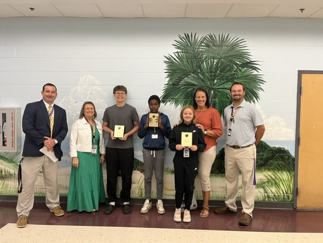 Left to Right: Mr. Reid (Principal), Mrs. Ransdell (API), Jackson Heydeck (8th), Quinton Hairston (7th), Emma Nichols (6th), Dr. Jeter (Asst. Principal), and Mr. Ard (Asst. Principal) GO TIGERS!!!