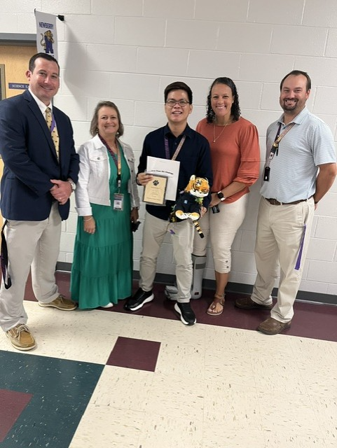 Pictured: Left to Right: Mr. Reid (Principal), Mrs. Ransdell (API), Mr. Aljun Jimenez-Teacher of the Month, Dr. Tonya Deese-Jeter (Asst. Principal), and Mr. Douglas Ard (Assistant Principal) Note: Thank you to Mr. Joe Trainor-Stokes Trainor for supporting the Teacher of the Month with the 27-Point Inspection-Free Oil Change (Stokes Trainor Dealership)
