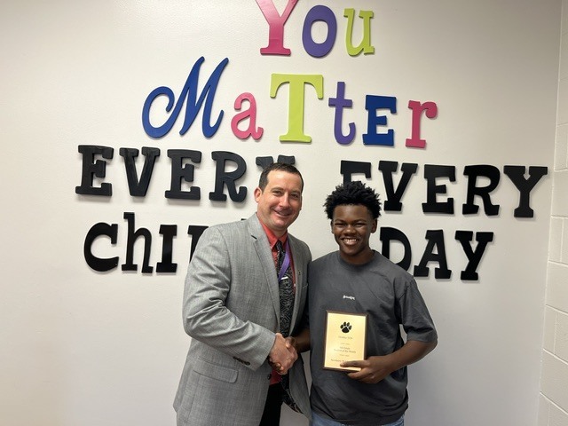 Picture: Left to Right: Mr. Reid (Principal) and Ethan Tribble (8th Grade-October Student of the Month)