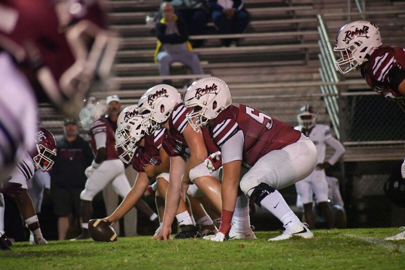 Rebels Football Team Getting set for a play at the 2026 Homecoming Game