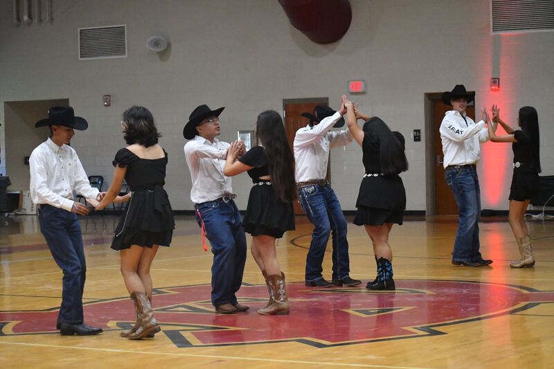 Students doing a showcase dance of dances popular in Hispanic countries