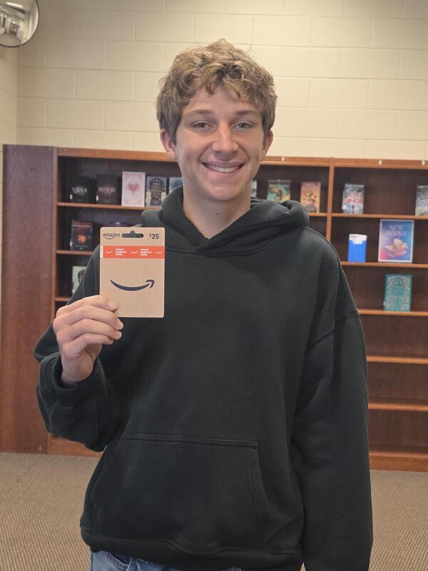 Cooper Piersol the winner of the Amazon Gift Card with his prize