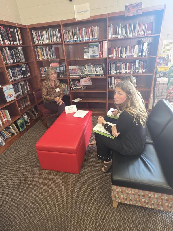 Students talking to a career professional about their career path at the Fall 2026 Human Library
