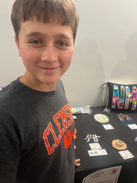 students with their art