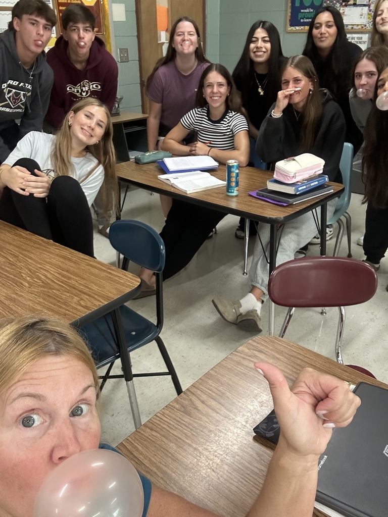 A class of high school students with bubble gum.