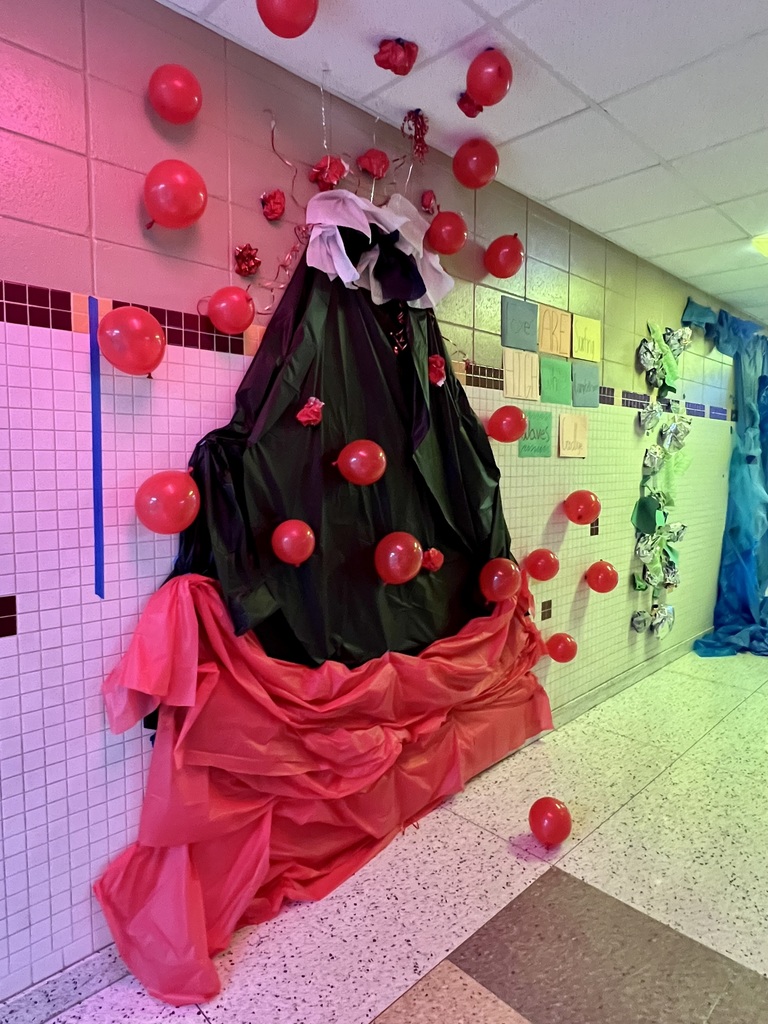 Hallway decorated with a two dimensional volcano.