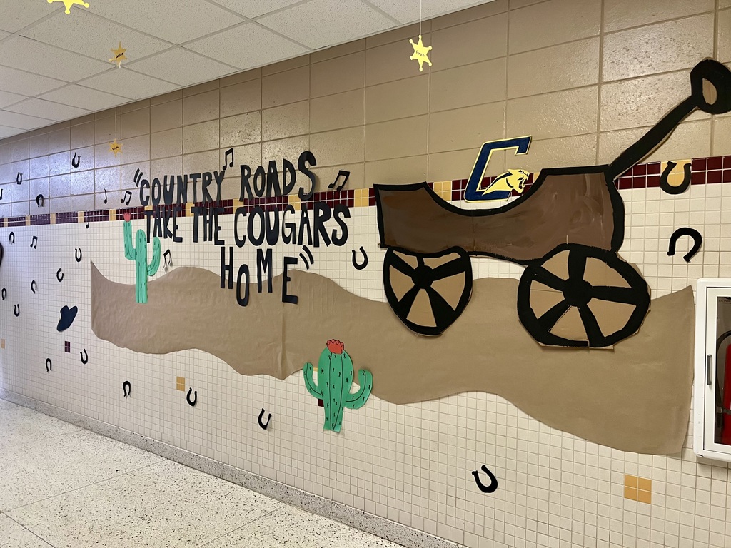 Picture of a hallway with a paper wagon on it.