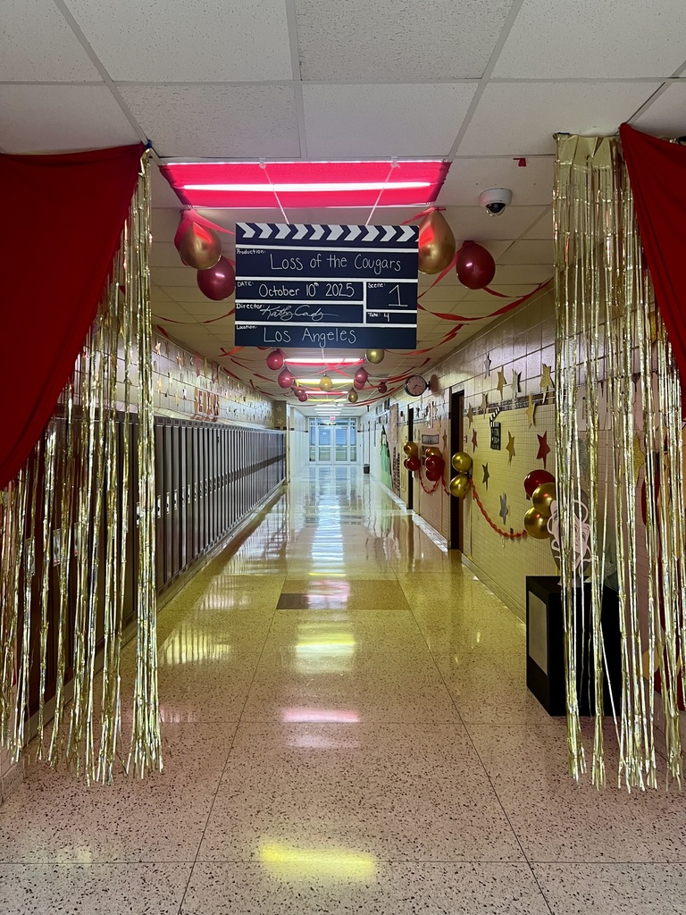 Picture of a hallway decorated with streamers.