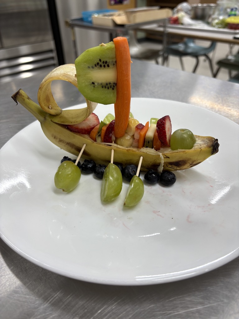 Fruit garnish to look like a boat.