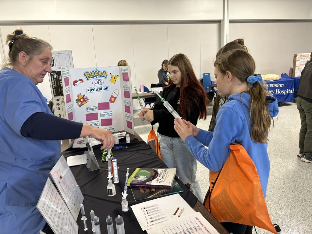 Middle school students exploring careers at a career expo.