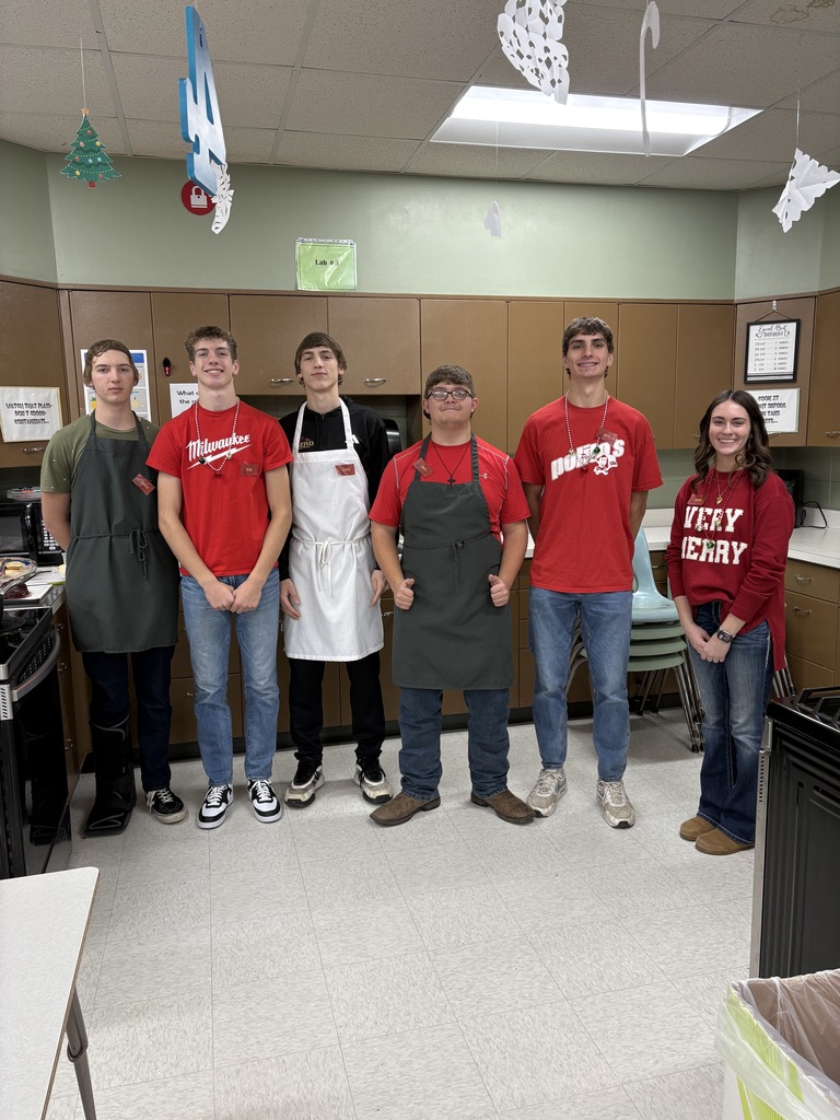 Six high school students standing in a line together.
