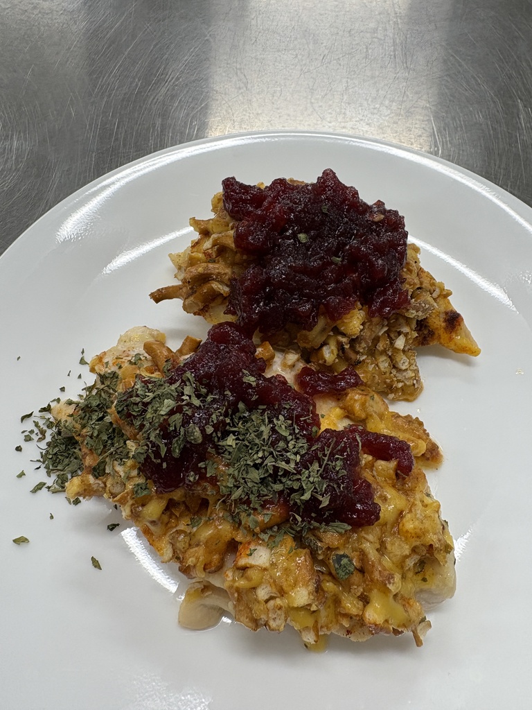 A chicken dish on a plate.