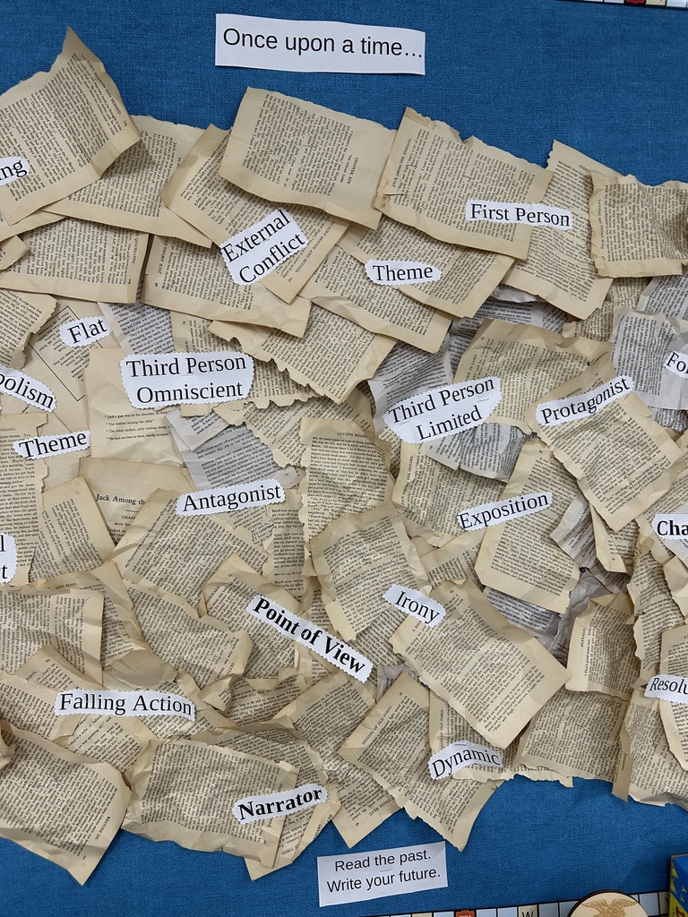 A bulletin board full of literary terms.