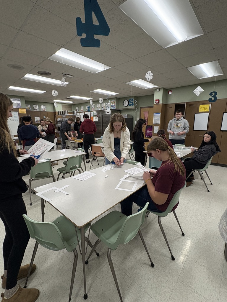 A class of high school students preparing heart healthy snacks.