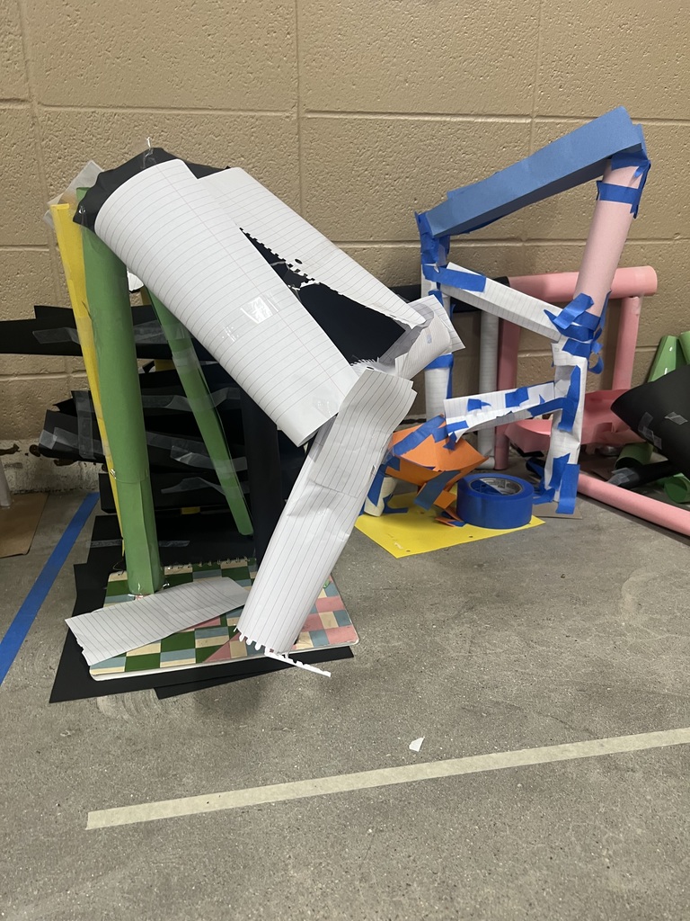 Marble track, created by middle school students, made from paper and tape.