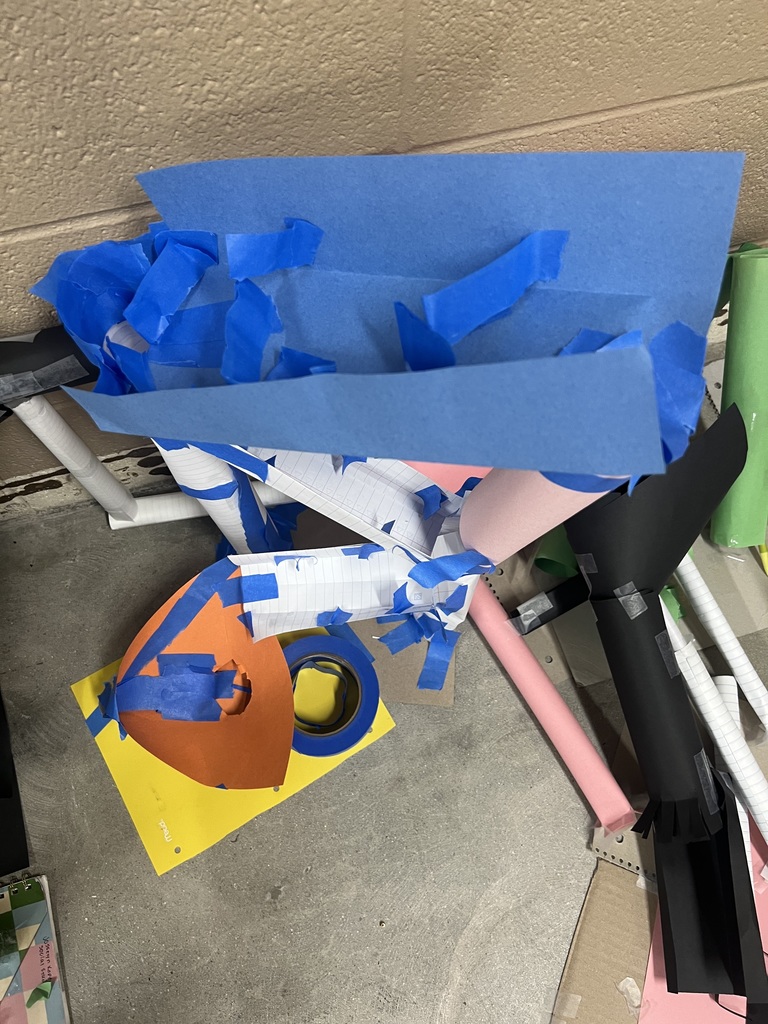 Marble track, created by middle school students, made from paper and tape.