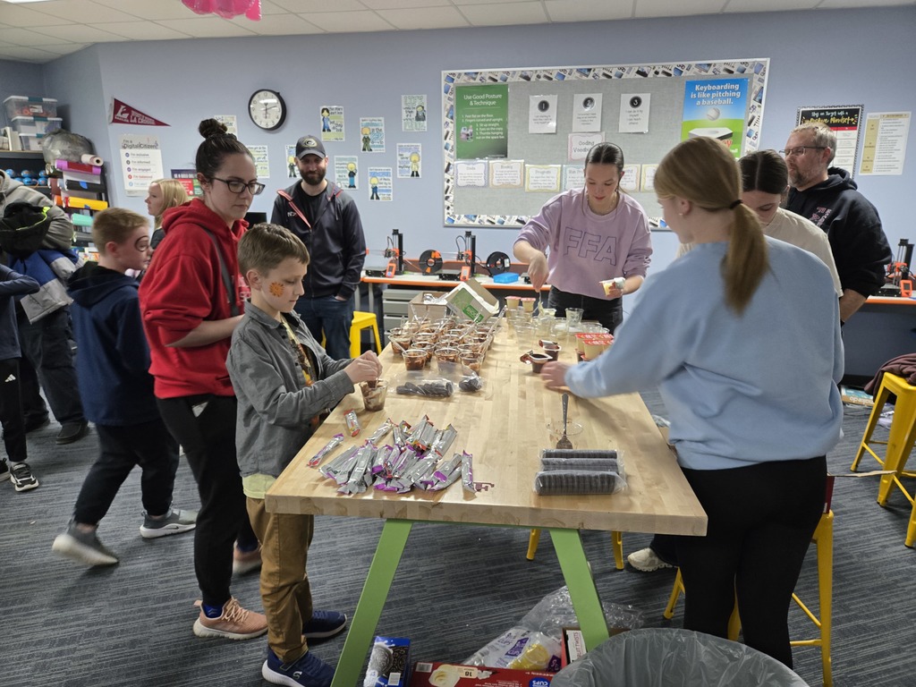 Families enjoying an activity at Family Literacy Night.
