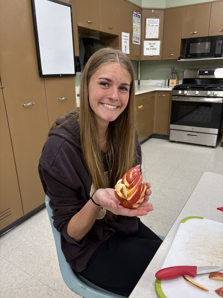 One high school student showing off her bird garnish.
