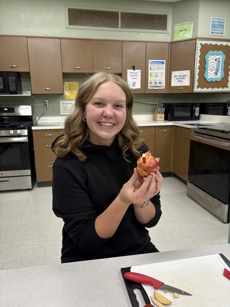 High school student showing off her bird garnish. 