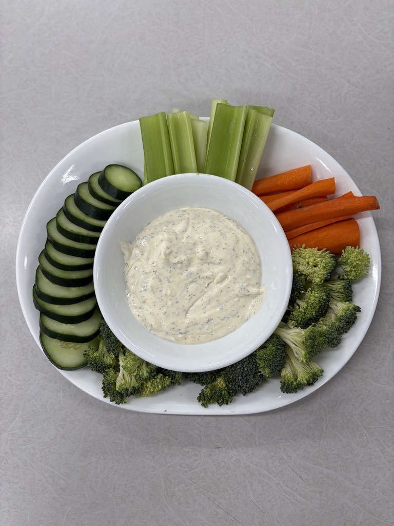 A plate of vegetables and dip.