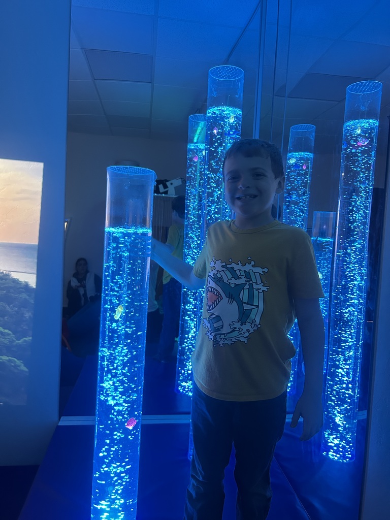 An early learning exploring a sensory room. 