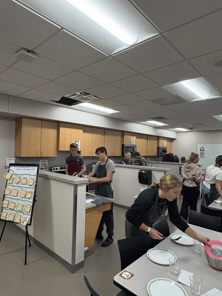 A class of high school students working in the Food Lab.