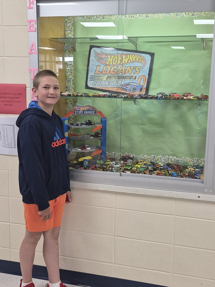 student with Hotwheels collection