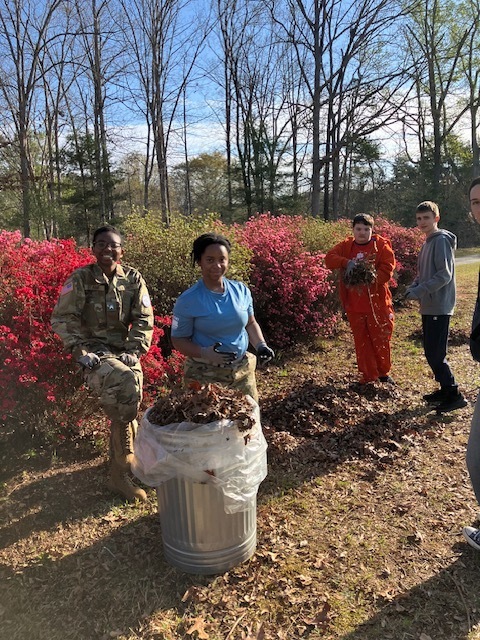 ROTC helping clean up at the Semper Fi barn