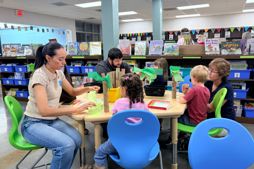 Preschoolers in Little Dreamers are working with their caregivers to create alphabet trees