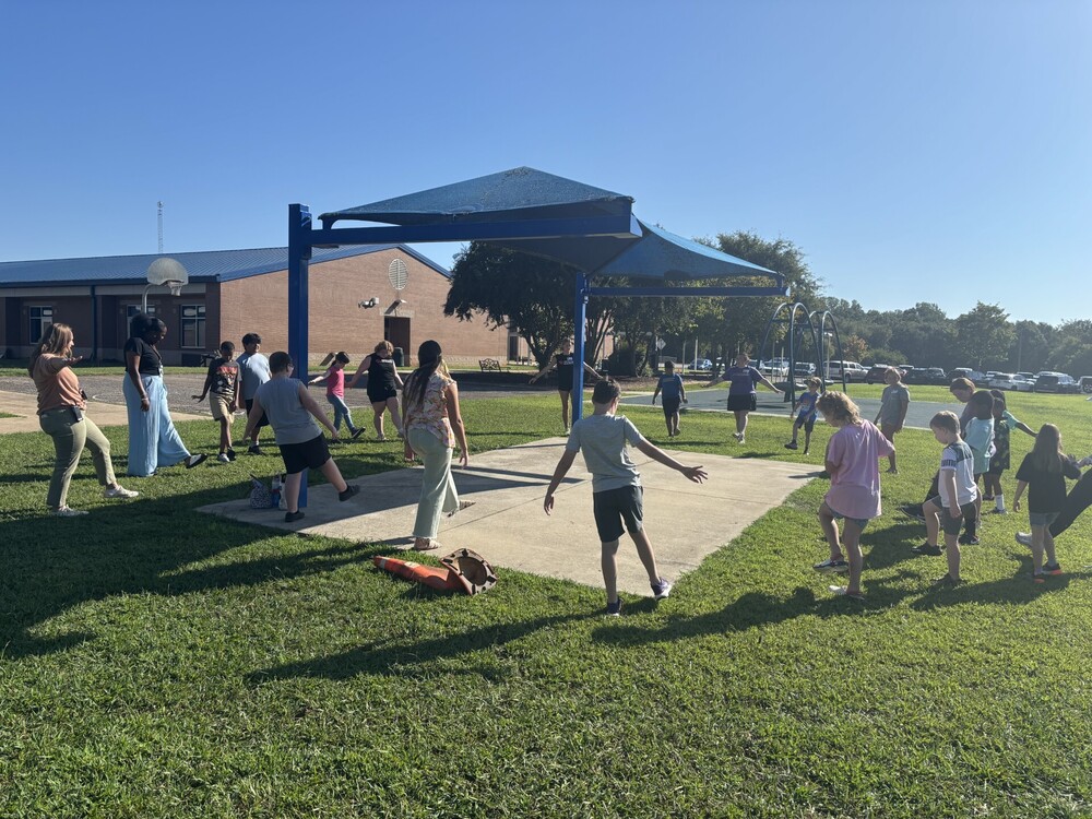 Mrs. Allred's class outside participating in the Adaptive Sports Program.