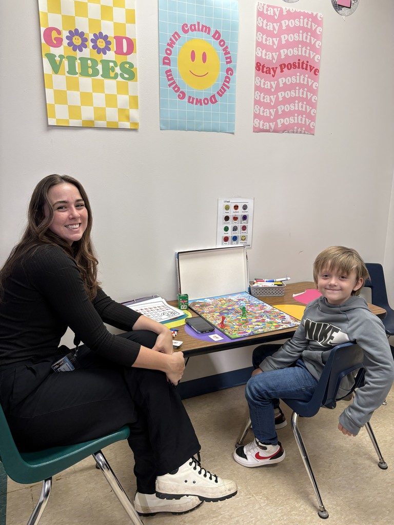 Ms. Zirkle helping a student.