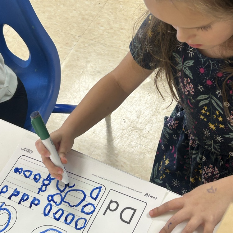 writing letter d